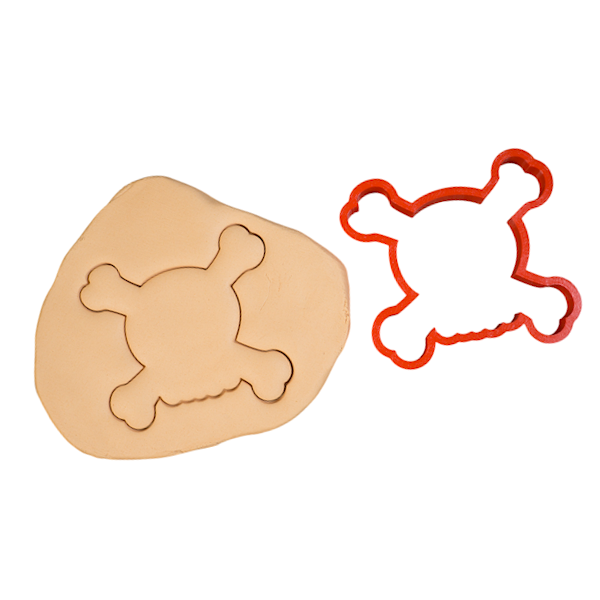 Вырубка пластиковая "Череп и кости" 10*9 см